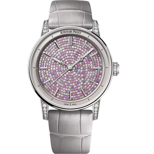 Audemars Piguet_Selfwinding Luxury watch with a silver strap and gemstone-studded face on a white background
