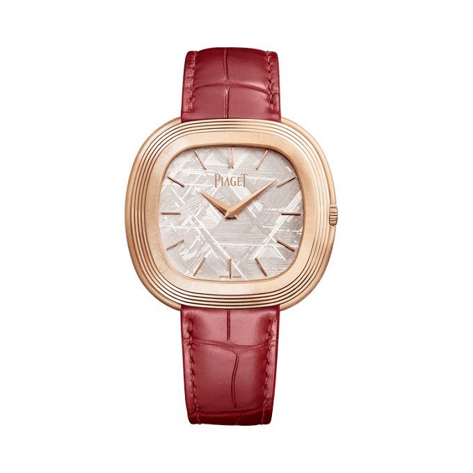 Piaget-AndyWarhol watch with red leather strap on a white background