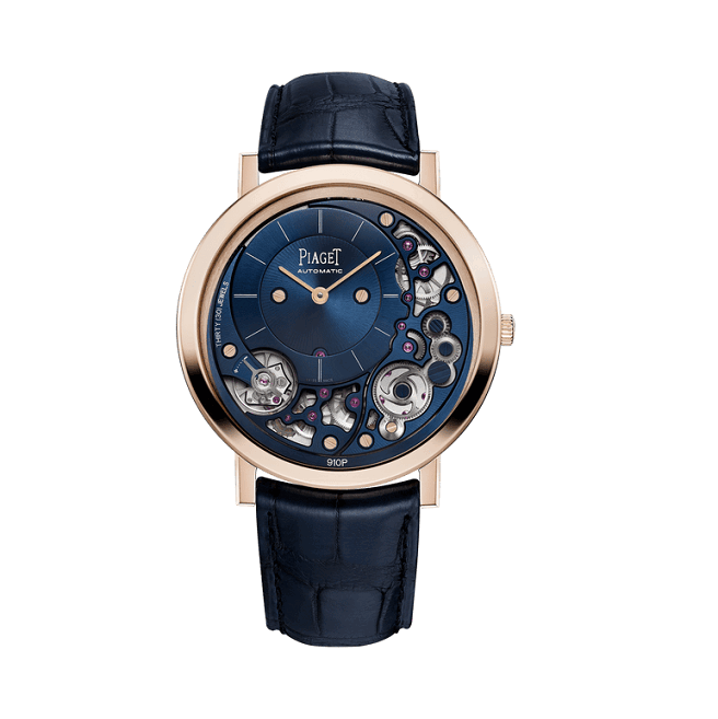 Piaget watch with blue face and black leather strap on a white background