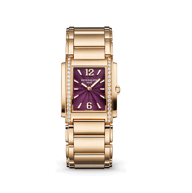 Gold watch with a purple face on a white background