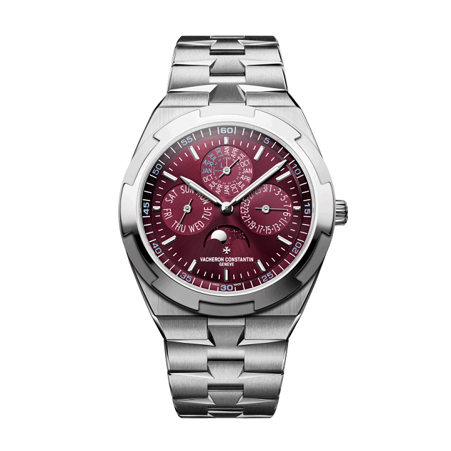 Vacheron Constantin Overseas Silver watch with a red face on a white background